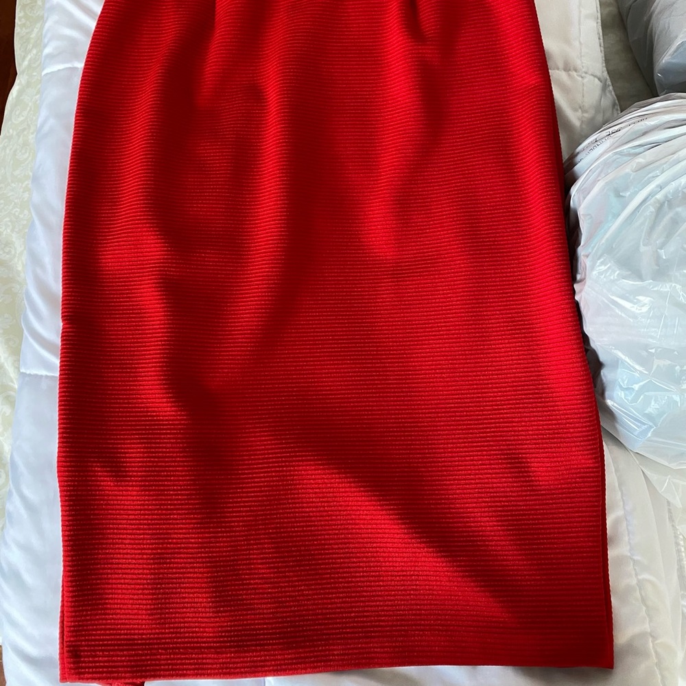 Express red dress in a size XS. Goes down to the knee but has a sexy slit. - Picture 6 of 6